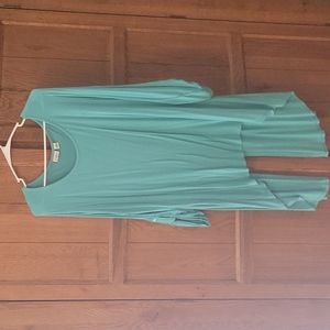 Green top. Split tail in back.